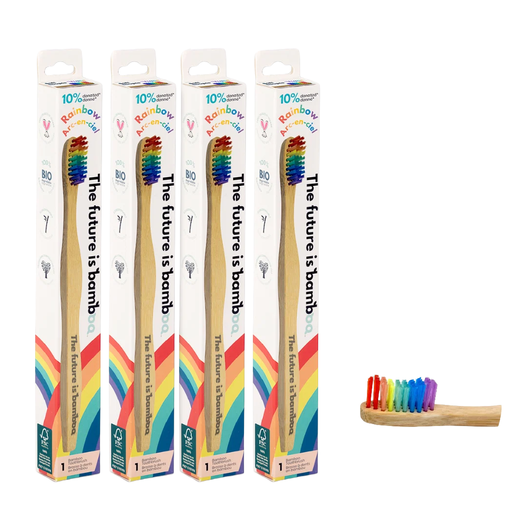 Four colorful bamboo toothbrushes for kids with rainbow handles, eco-friendly design from THE FUTURE IS BAMBOO brand.